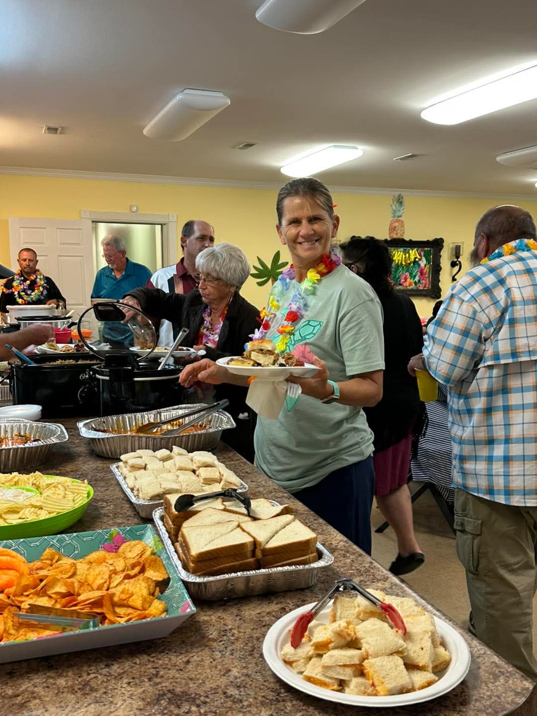 Church family sharing a fellowship meal